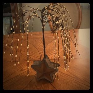 Firework trees shooting out of a stare bace